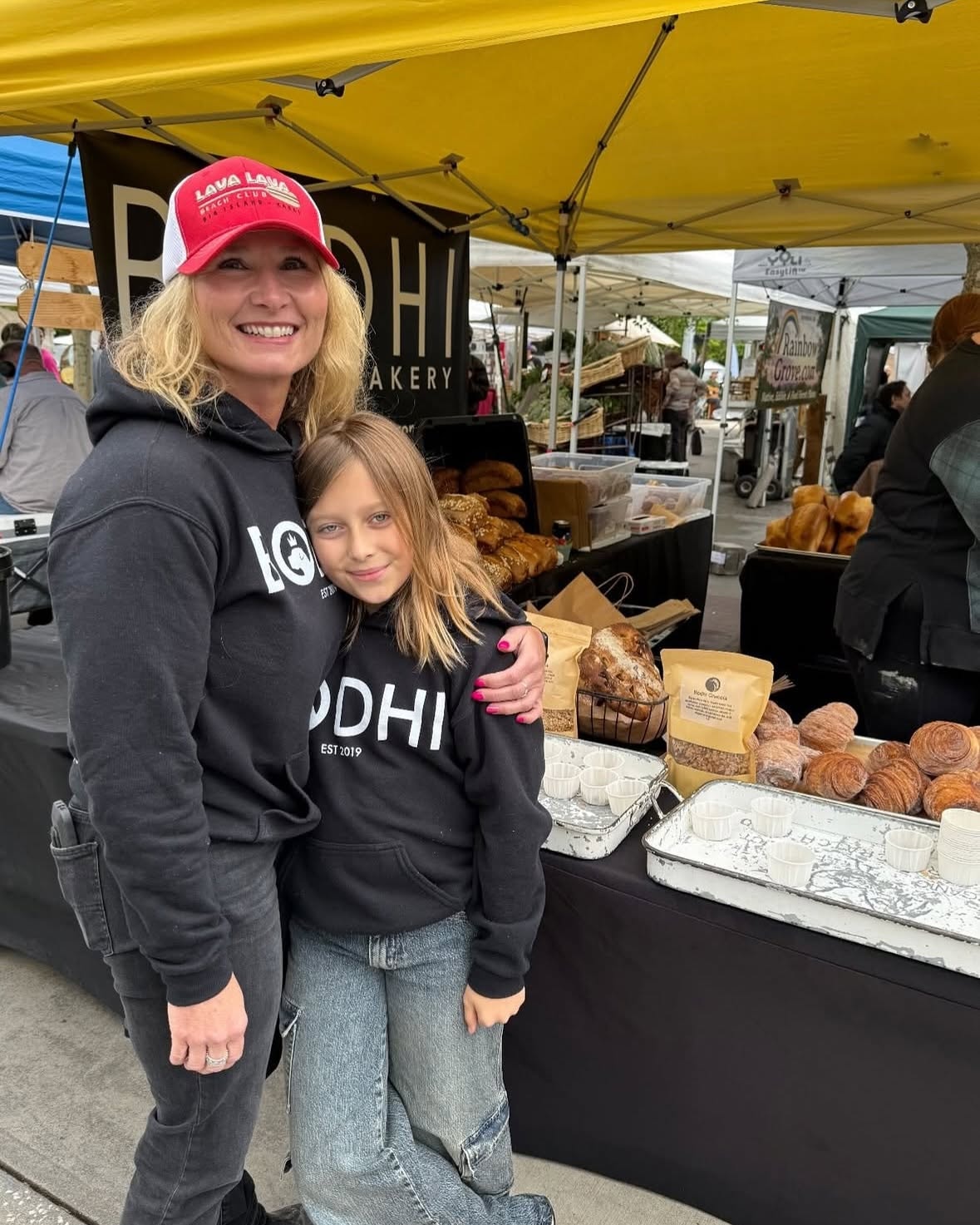 Croissants, danishes, and fresh pastries at the Bodhi farmers market table