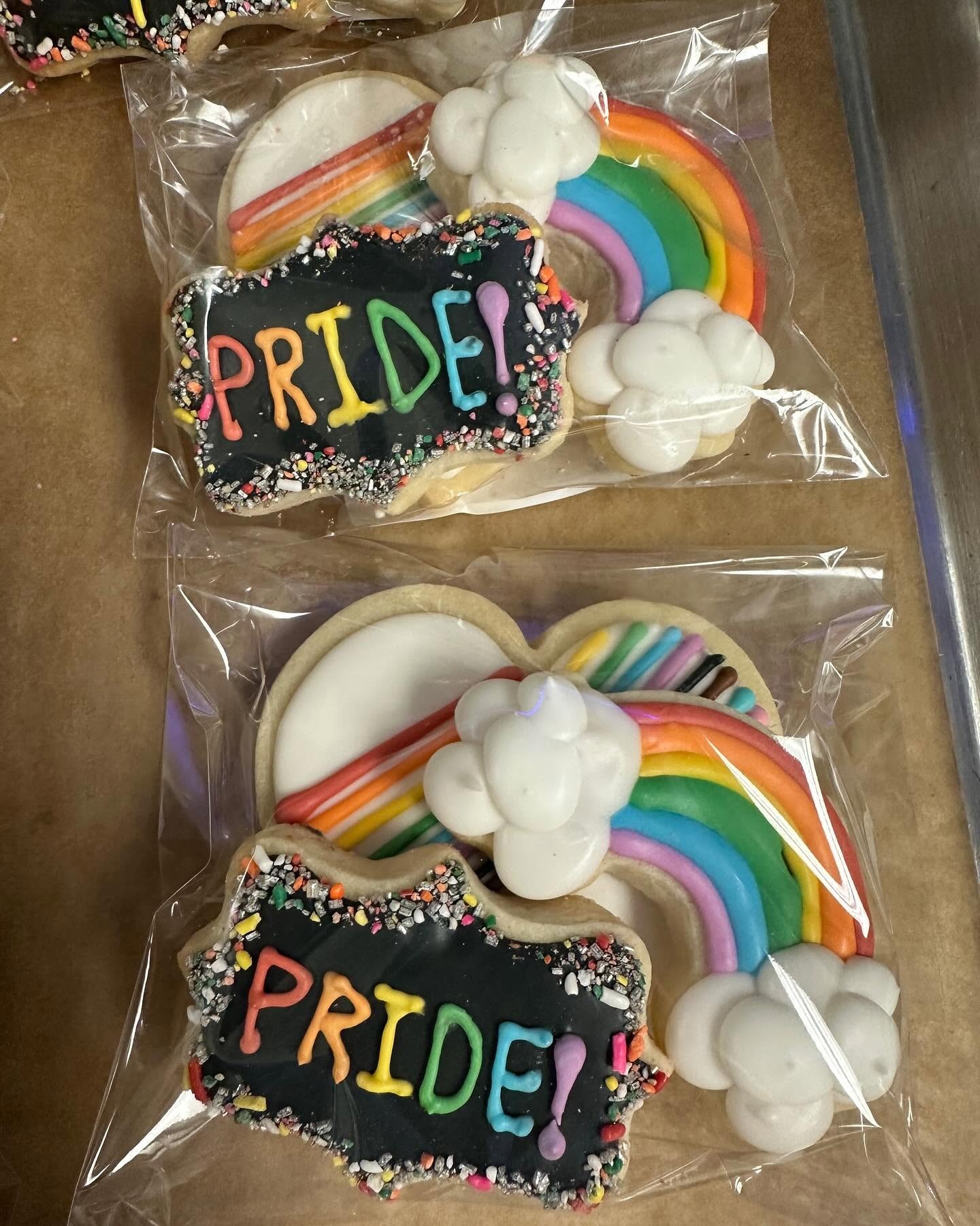 Custom Pride cookies with rainbow and cloud designs