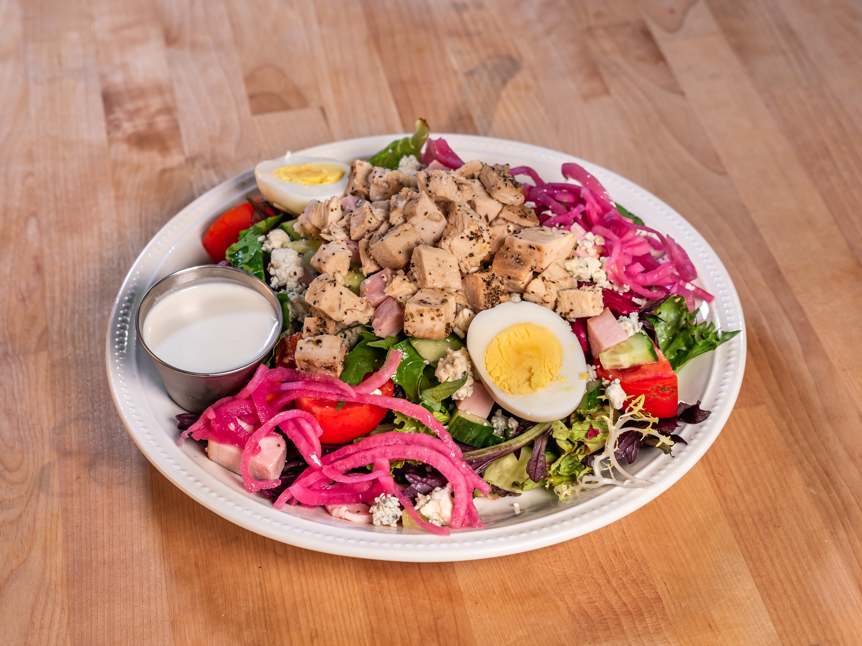 Grilled chicken salad with hard-boiled eggs